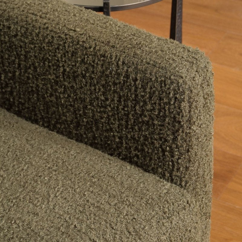 Side view of the Tisdell Kale Faux Sheepskin Swivel Chair by Uttermost