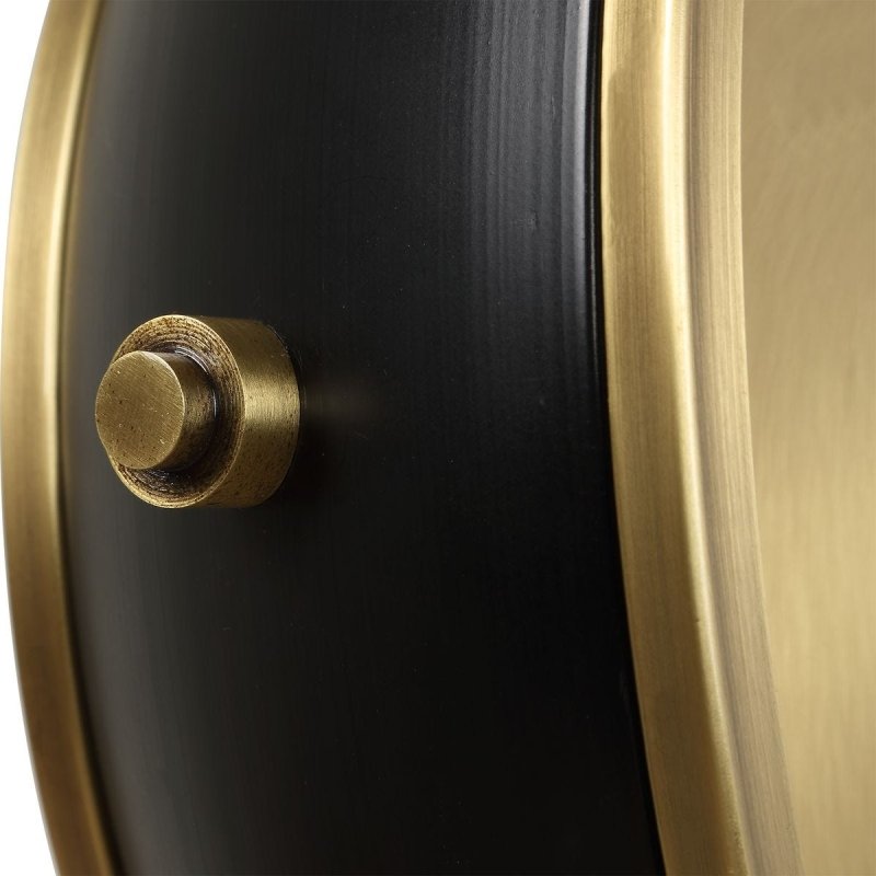 Close-up of brass frame edge on the Velar Brass and Black Marble Table Clock