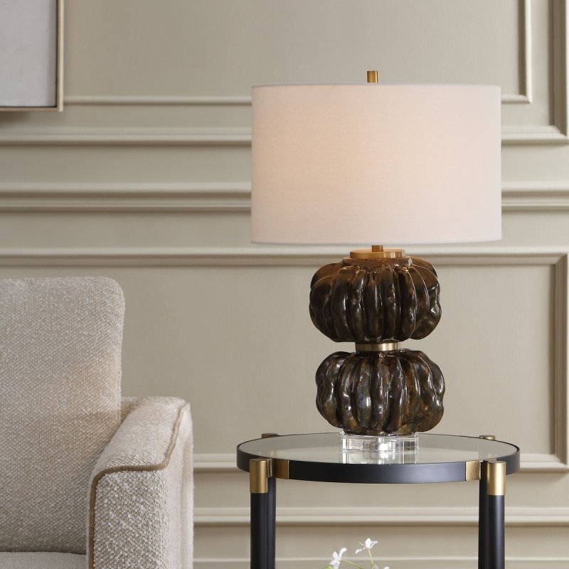 Jaudon Stacked Table Lamp styled in a room setting