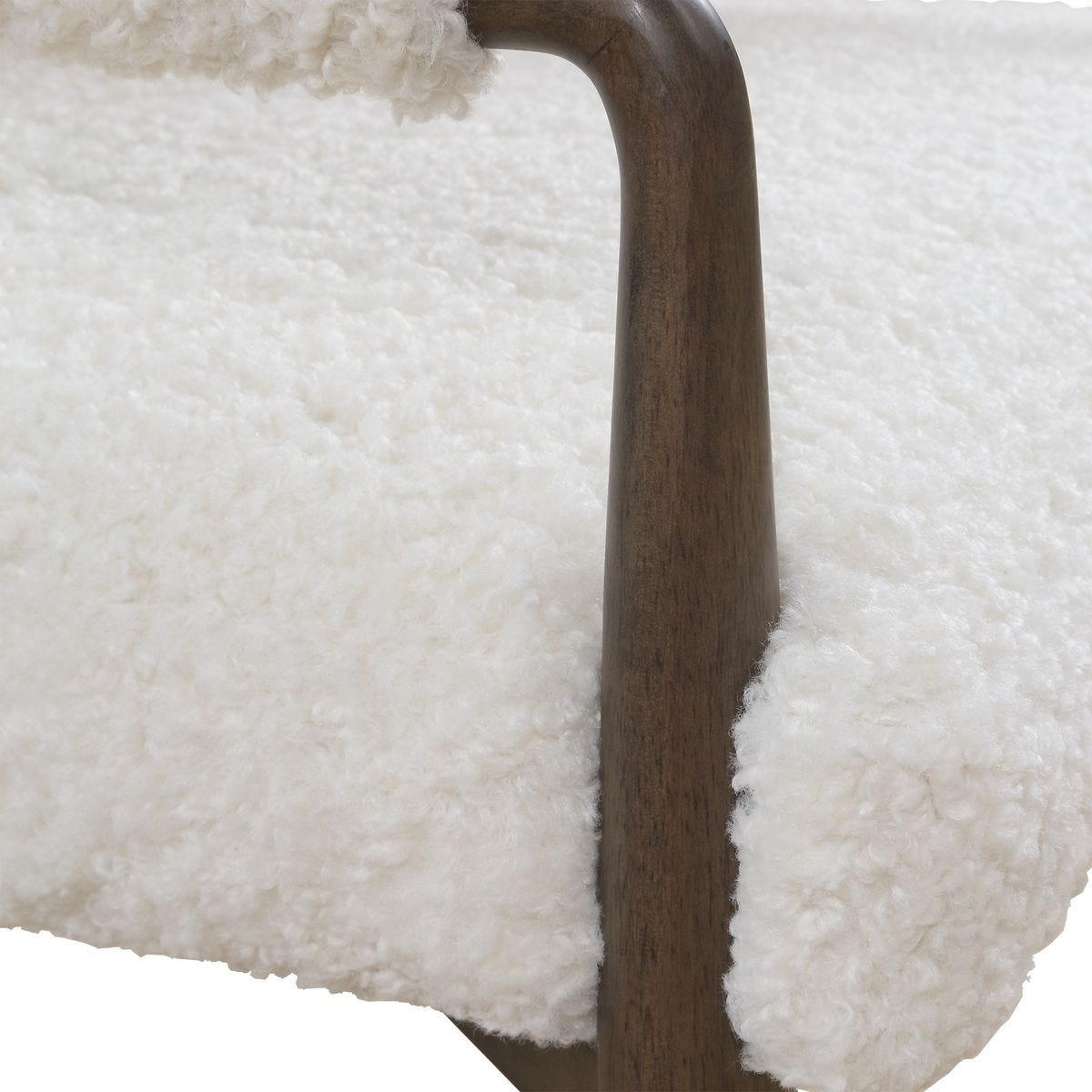 Close-up of the Austell Dark Walnut Faux Shearling Dining Chair material and finish