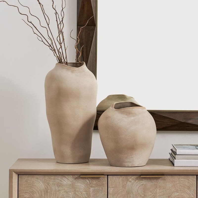 Shadow Play Buff Indoor-Outdoor Vases Set of 2 styled in a wood console with natural accessories